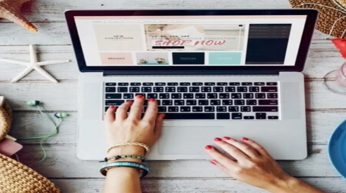 Browsing wedding inspiration on a laptop.