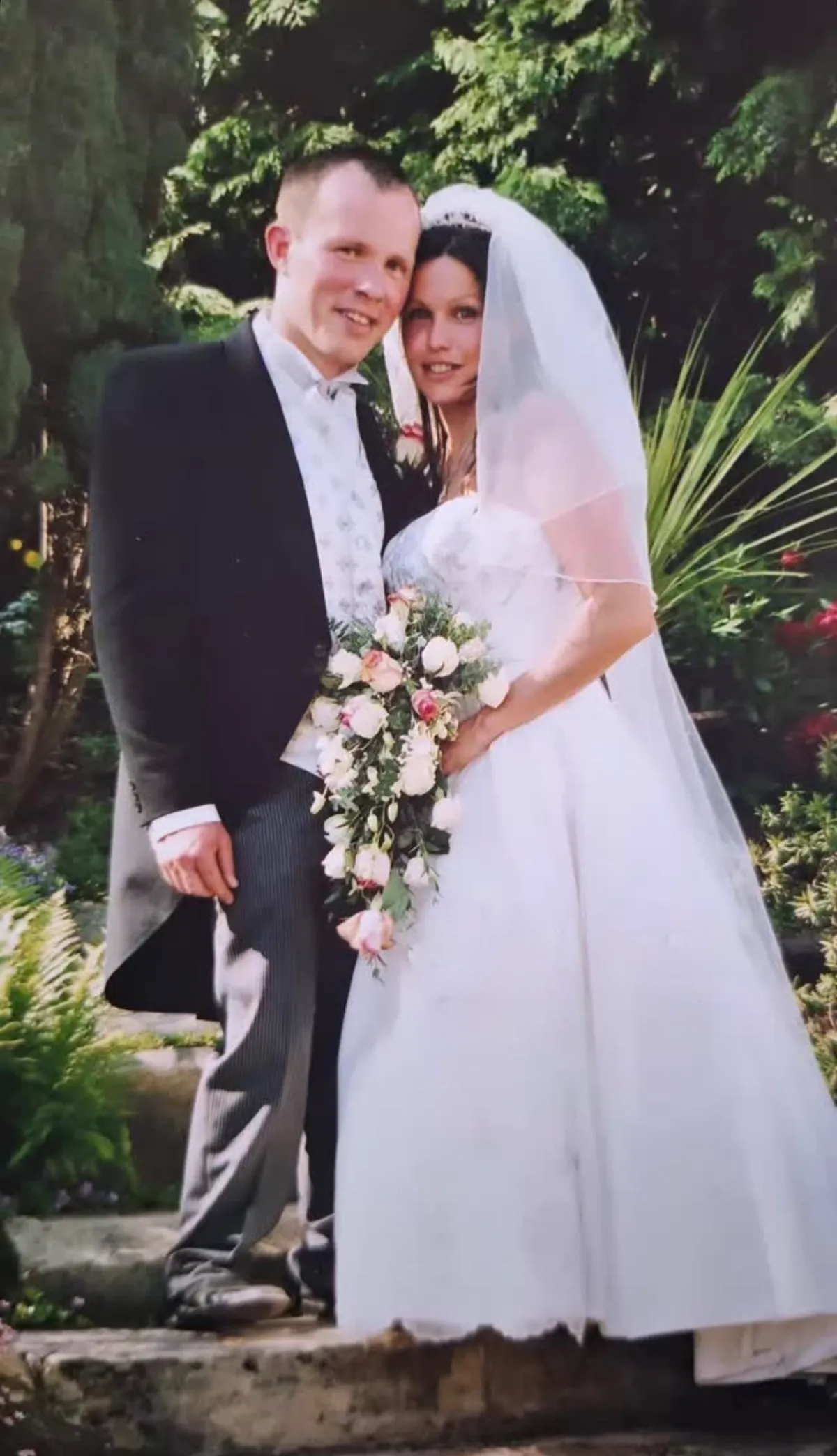 Jess and Phillip together on their wedding day in the woods